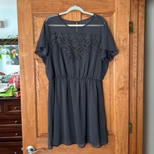 Graphite gray, lace top detail, short-sleeved, above knee length (I’m 5’7”).